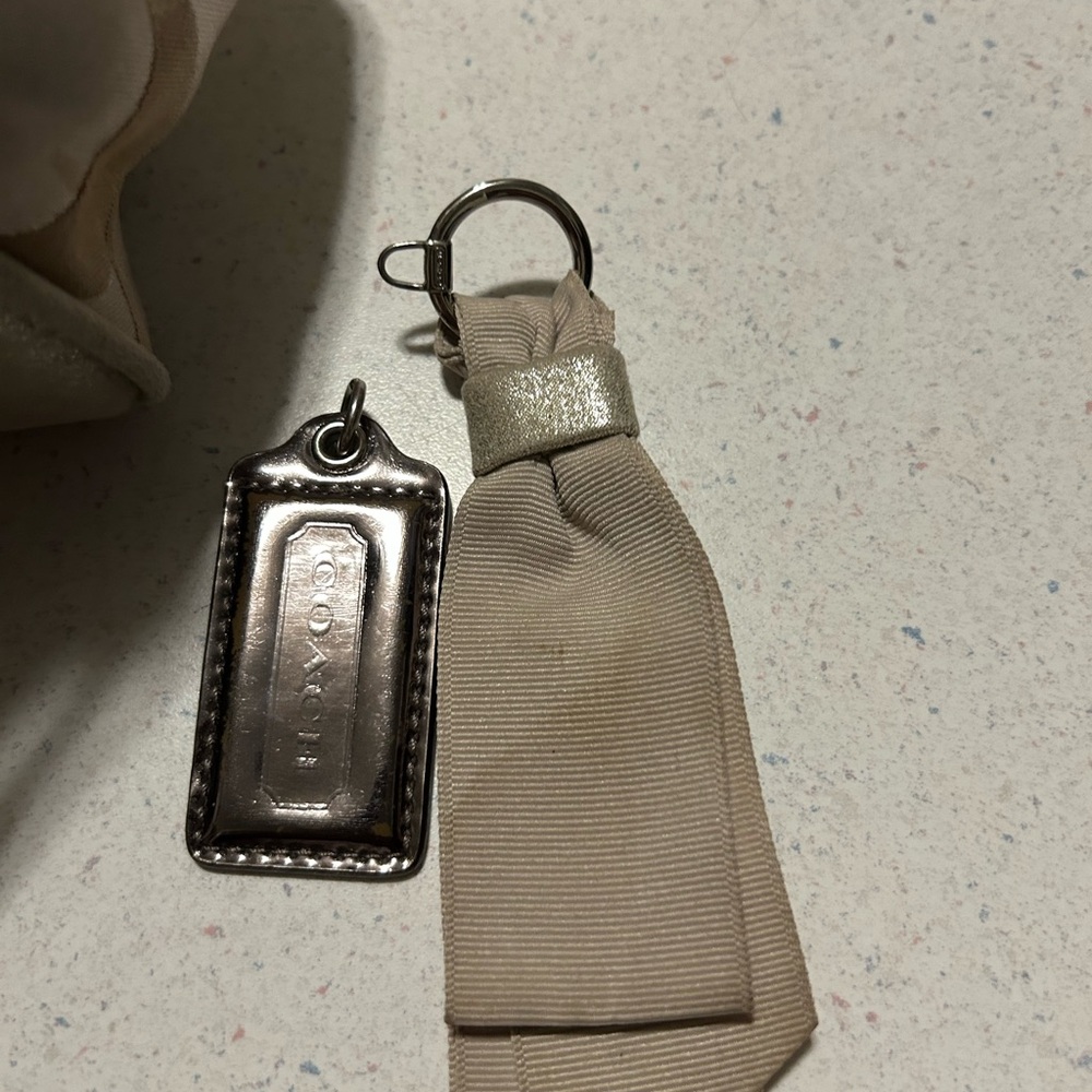 Elegant Coach Tan Monogrammed Handbag - Picture 2 of 9
